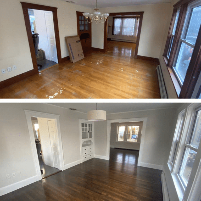 A bright, empty room with drop cloths covering the floor, a ladder, paint buckets, and a roller extension pole, indicating preparation for professional interior painting.